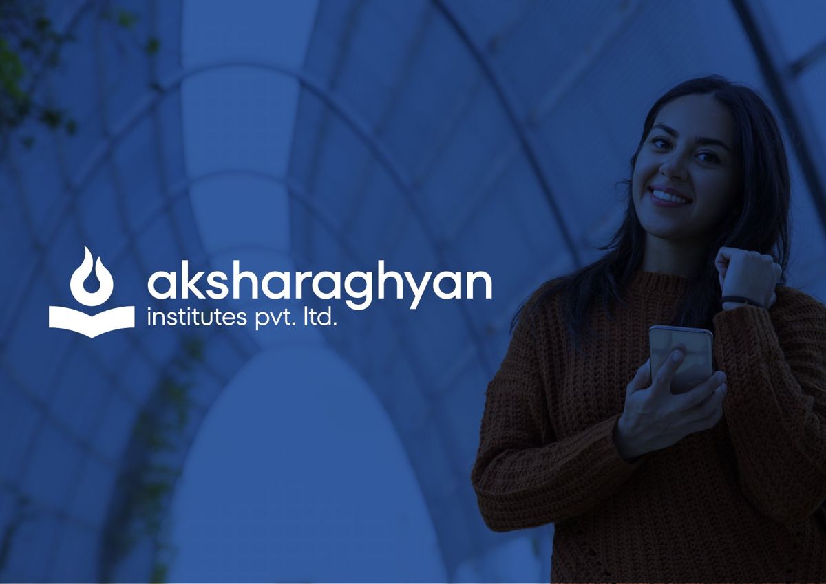 Aksharaghyan Institutes logo beside a smiling student holding a phone